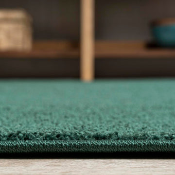 Haze Solid Low-pile Area Rug Emerald
